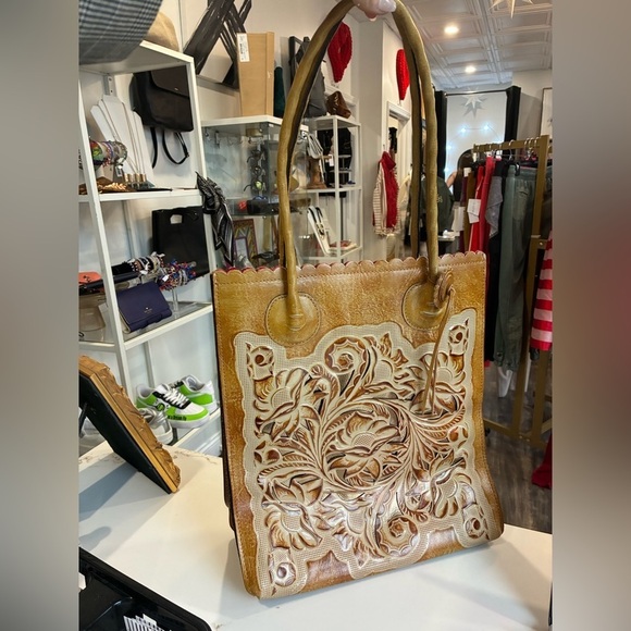 Patricia Nash Handbags - Patricia Nash Cavo cutout leather tote in a burnished tan with a gold underlay